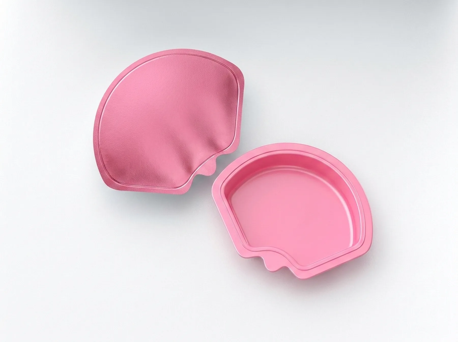 A round unprinted blister pack opened along its hinge